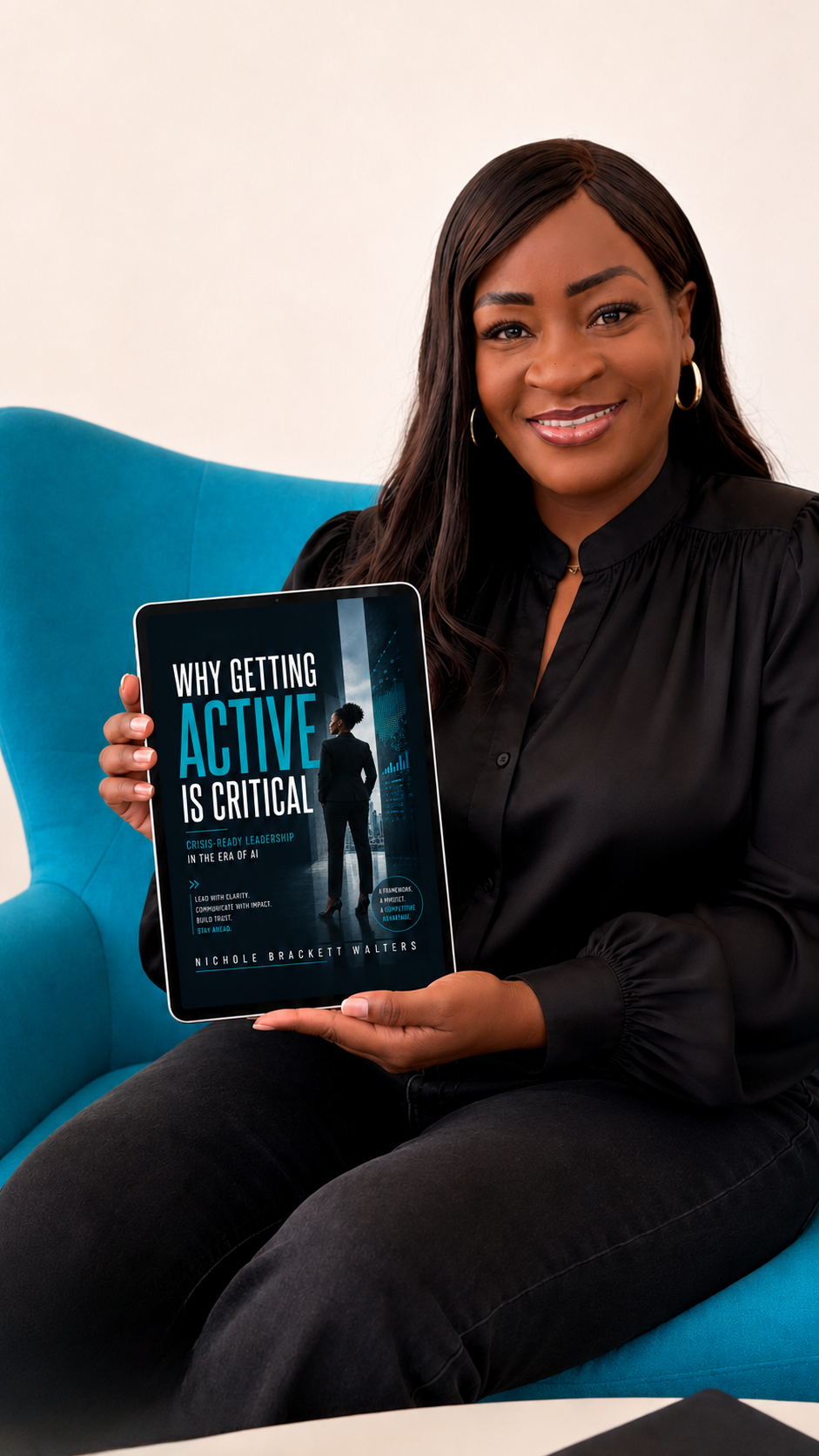 Nichole Brackett Walters holding the Why Getting ACTIVE Is Critical eBook